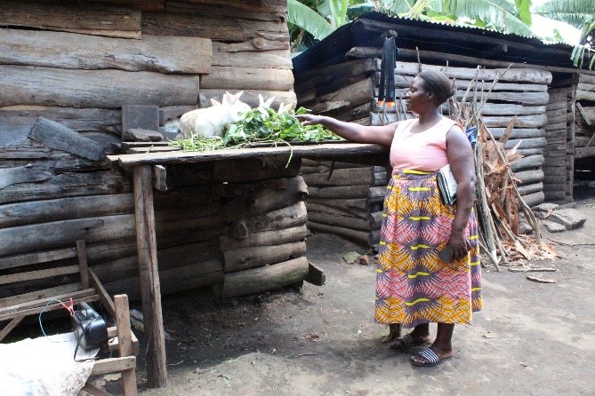 Nkoojo Mary, showing other income generating activity implemented by the group